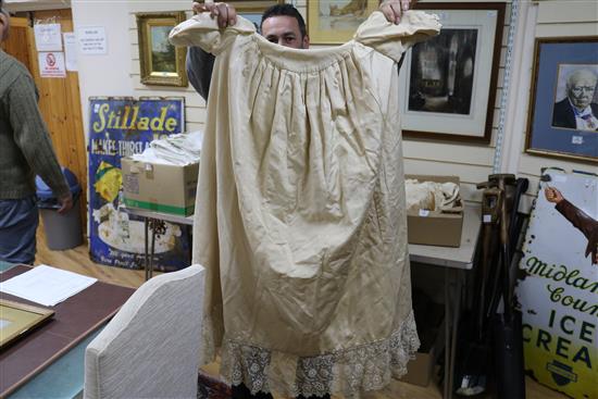 Two ornate babys 19th century christening capes, a silk and lace wedding train, waxed headdress and veil